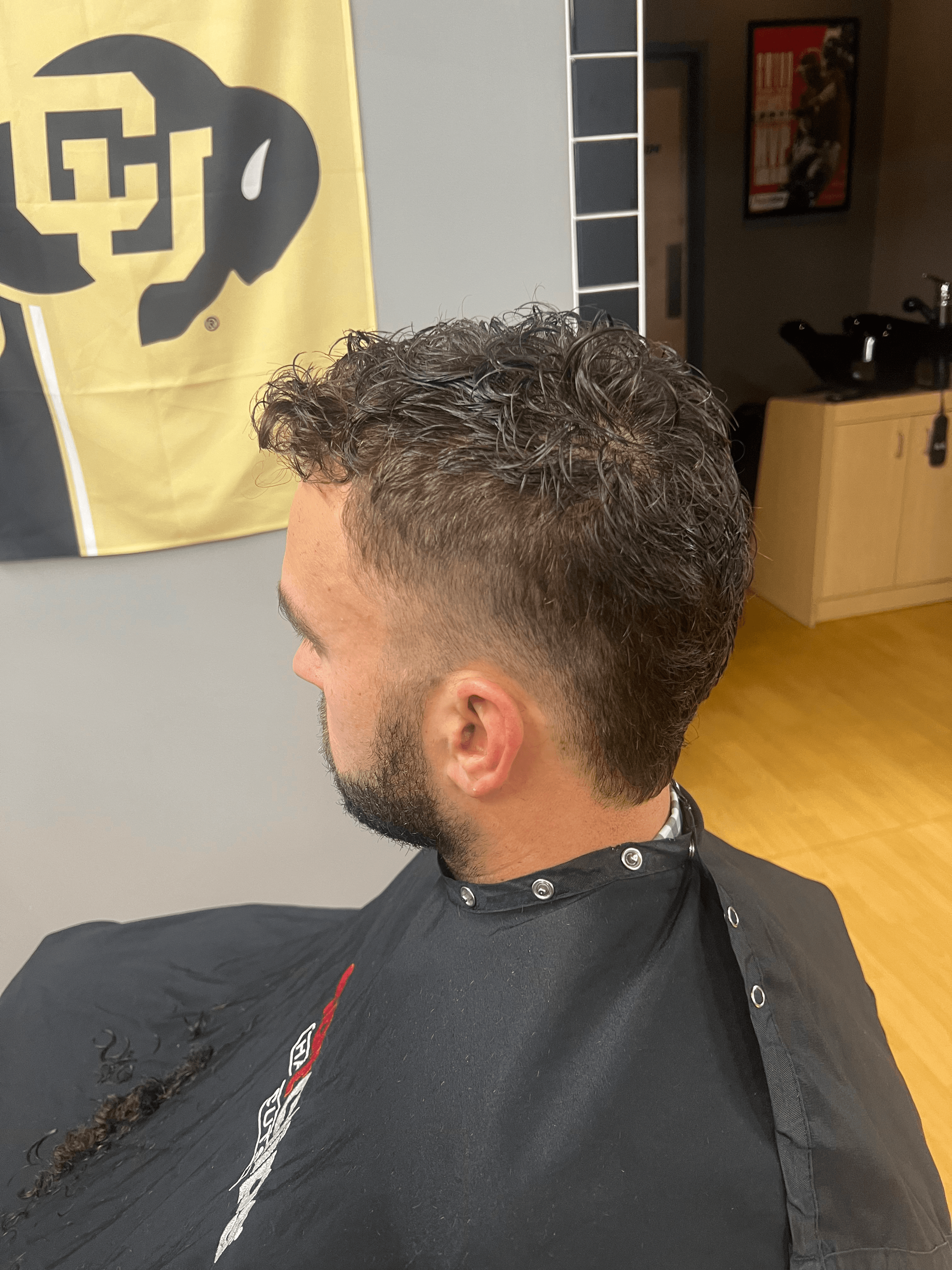 Curly Textured Top with Low Fade hairstyle